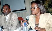 Minister for EAC Affairs Monique Mukaruliza with Ministry  PS Robert Ssali during a meeting with the Press. (Photo/ J Mbanda)