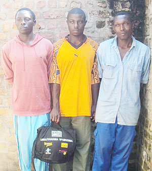 NABBED: Claude Ndungutse, Marcel Birushyabagabo and Assumani Niyikiza at Bwishyura Police station yesterday. (Photo: S. Nkurunziza)