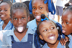 Deworming. Children are given medication to fight intestinal parasites