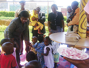 The Minister of Gender, Jeanne d;Arc Mujawamariya with some of the children yesterday