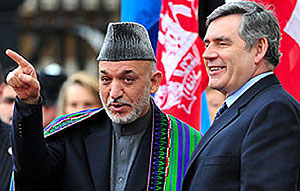 Afghan President Hamid Karzai, left, and Britainu2019s Prime Minister Gordon Brown arrive at the London Conference on Afghanistan