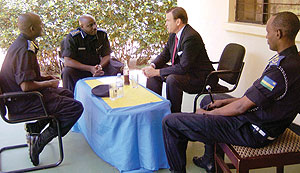 The Commissioner General of Police, Emmanuel Gasana chats with US Ambassador Stuart Symington together with senior police officers at the training school. (Photo S. Rwembeho)