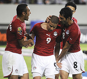 Mohamed Zidan of Egypt(CL) celebrates after scoring the second goal against Algeria during their semi final