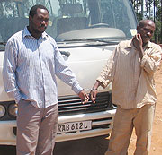 Gasamunyiga (L) and Ndumuhire (R) infront of the vehicle they allegedly stole. (Photo/ B. Asiimwe)
