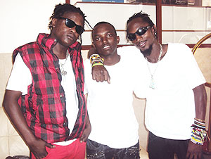 (L-R Weasel, Tom Close and Radio pose for a group photo, shortly after the interview. (Photo, by Linda Mbabazi).