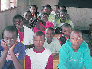 Students under 9YBE attend class for the first day of the term in Musanze. 