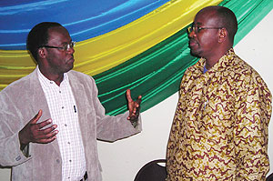 Southern Province Governor, Fidele Ndayisaba,with Local Government Minister, James Musoni, at the retreat. (Photo B Mukombozi)