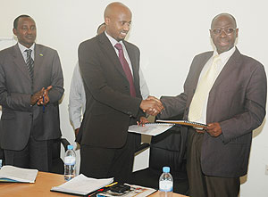 The New Times Managing Editor, Arthur Asiimwe, at Handover at Media High Council handover ceremony on Monday. (Photo/ F. Goodman)