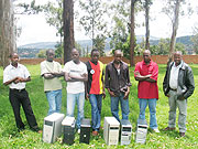 The suspects paraded behind the equipment  they used in pirating music. Police hsd mounted a crackdown on piracy (Courtsey Photo) 