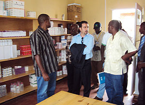 Italian cooperation country representative  Valerio Ruggirello (C), Gatsibo district Mayor, Anselme Majoro Rurangwa (R) touring Rwimbogo Health Centre