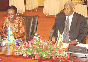Rwandau2019s Foreign Minister, Louise Mushikiwabo, and her Ugandan counterpar,t Sam Kutesa, during the Joint Permanent Commission meeting in Kampala. (Photo/ E. Kabeera)