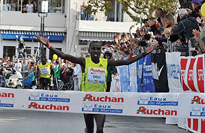 Dieudonne Disi celebrates after crossing the finish line first in a recent race in Marseille. (File photo)