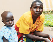 Elisa Munyembabazi, 4, with his Mother awaiting surgery at CHUK yesterday. (Photo/ J Mbanda)