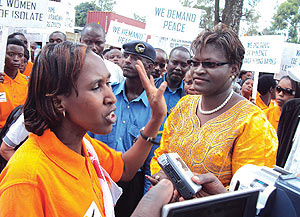 WFW Country Director, Bella Kabarungi and her Congolese counterpart, Christine Kalumba during their meeting in Rubavu district. (Photo/ R Mugabe)