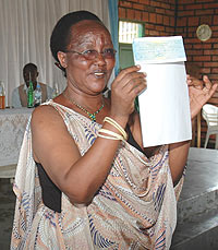 Genevieve Iryanyawera shows off her prize (Photo: F.Goodman)