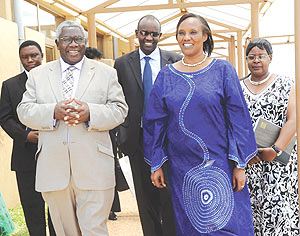 CPA Secretary General Dr. William Shija (L) sharing a light moment with Speaker Rose Mukantabana at the parliamentary buildings yesterday. (Photo/ J. Mbanda)