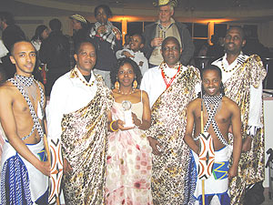 Ambassador Christine Nkulikiyinka and the Rwanda delegation in Germany with the trophy. (Courtesy photo)