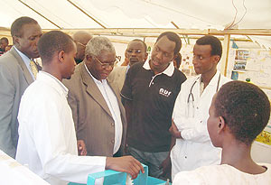 Dr Shija (c) and the Deputy Speaker Jean Damascene Ntawukuriryayo at the Pharmacy department stand. (Photo: J.P Bucyensenge)