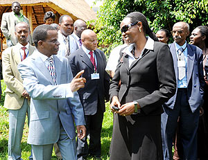The Minister of Agriculture Agnes Kalibata (R) and UNECA Sub Region Office Director Antonio Pedro, chat during the meeting. (Photo J. Mbanda)