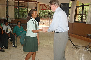 WELL DONE; Green Hills Headmaster shaking hands with one of the best students, Sarah Agatoni (Photo; F. Goodman)