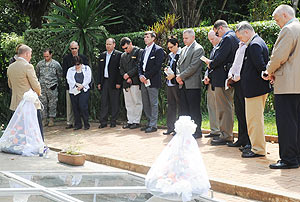 The US military delegation pay their respects after lying a wreath at Kigali Genocide Memorial centre yesterday. (Photo; J. Mbanda)