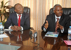 The Minister of Education Dr. Charles Murigande addressing the meeting yesterday as the AfDB Resident Representative Diko Jacob Mukete looks. (Photo; F. Goodman)