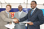 DEAL STRUCK; Joseph Habineza (C) graced the signing of the sponsorship deal signed by Bralirwau2019s MD, Sven Piederiet (L) and Ferwafau2019s Raoul Gisanura yesterday 