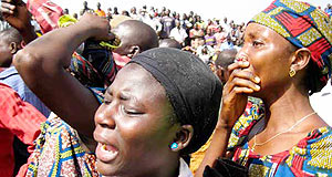 What goes on in Nigeria has impact in the region and Africa as a whole. Women mourn their lost relatives. (Net Photo)