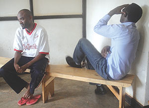 Jean Baptiste Sangano (L) Christian Eddy Nkuyubwatsi at Muhima Police Station. (Photo/ E. Mutara)