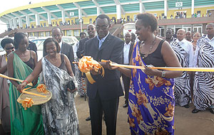 The Prime Minister Bernard Makuza (C) during the cutting of the ribbon to inaugurate Rwanda Village at Amahoro National Stadium yesterday. (Photo/ F. Goodman)
