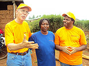 World Relief Country Director Phil Smith (L) and Vice Mayor Social Affair Lu00e9onile Narumanzi (centre) at Maranyundo village. (Photo: S. Rwembeho)