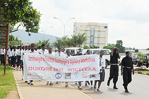 School girls proceeding to Amahoro National stadium during the march yesterday. (Photo; F. Goodman)