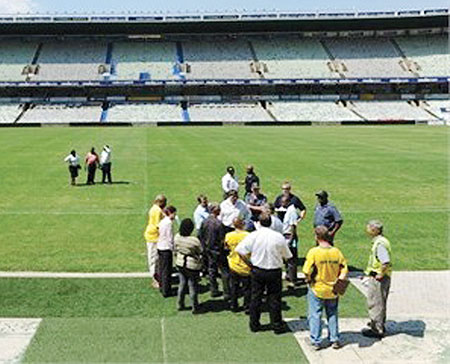 Checking the grounds to ensure quality control.