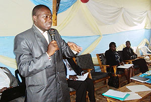 Innocent Telimbere, the sector council chairman explains the  prospects of the Mushishiro investment group. (Photo: D. Sabiiti)