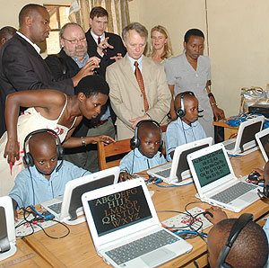 Pupils at Ecole Primaire de Kimihurura at the launch of the e-learning software yesterday. (Photo/ F. Goodman )