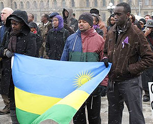 Robert Manzi (R) with members of the Rwandan Community in Canada at the commemoration event last year
