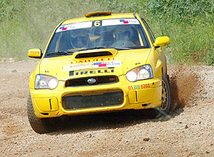 Giancarlou2019s Subaru negotiates a corner during last yearu2019s KCB Mountain Gorilla Rally. The national champion has vowed to up-stage Jamie Whyte in Uganda. (File Photo)