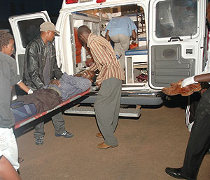 Medics loading one of the accident casualties onto a SAMU truck last evening. The accident left six with serious injuries. (Photo/ F Goodman)