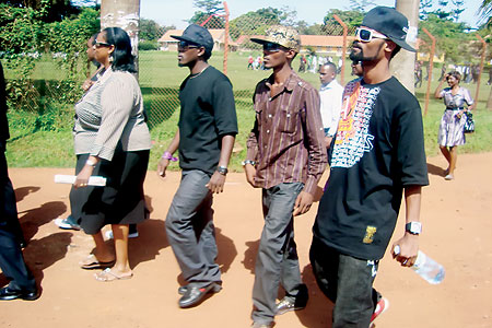 (L-R) Alpha (Clad in a black T-shirt and a cap), Nasty Lee (Alphau2019s manager) and Sparks.