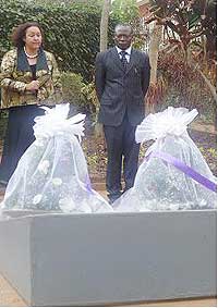 Visitors pay thier respect to Genocide victims laid to rest at Kigali memorial center.