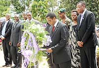 President of the Senate Vincent Biruta paying tribute to genocide Victims at Rebero as other dignitaries who included EALA speaker Abdirahin Abdi (R) look on. (Photo J Mbanda)