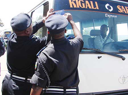 Top Police officers put a sticker on a passenger service van during last yearu2019s traffic week (File Photo)