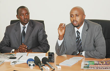 Media High Council officials, Patrice Murama (L), and Arthur  Asiimwe announcing the suspension of two local tabloids on  Tuesday ( Photo F. Goodman)