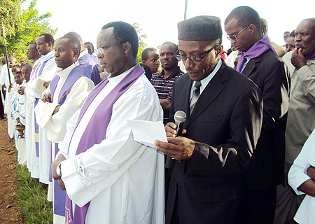 Mufti Sheikh Saleh Habimana and Father Albert Mpasumbuko (on his right) during memorial service. (Photo / S. Rwembeho)