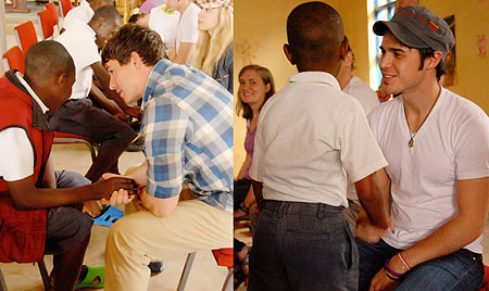 L-R : Shoe Fitting-- Many Rwandan children now have their feet protected thanks to the new shoes they recieved ; Kris Allen, the American Idol musical star enjoys a light moment with one of the children who recieved shoes. (PhotoS by Mark Darrough) 