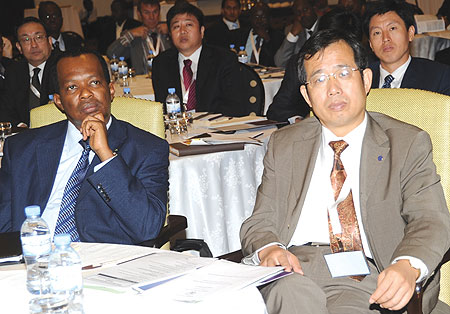 Infrastructure Minister, Vincent Karega, and Chinese Ambassador to Rwanda, Sun Shuzhong, at the meeting. (Photo/ J Mbanda)