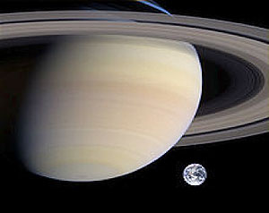 A rough comparison of the sizes of Saturn and Earth.