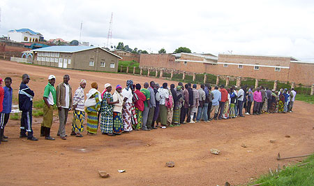 RPF members of Gisuna village line up to elect their presidential candidate on Saturday. (Photo / A.Gahene)
