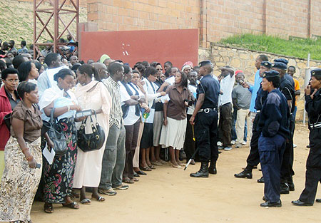 A group of Muhanga residents line up for checking before the provisional driving license tests. (Photo: D. Sabiiti)