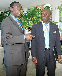 Prime Minister Bernard Makuza with Dalo Gbouable yesterday at the Prime Ministeru2019s office   (Photo; F. Goodman)